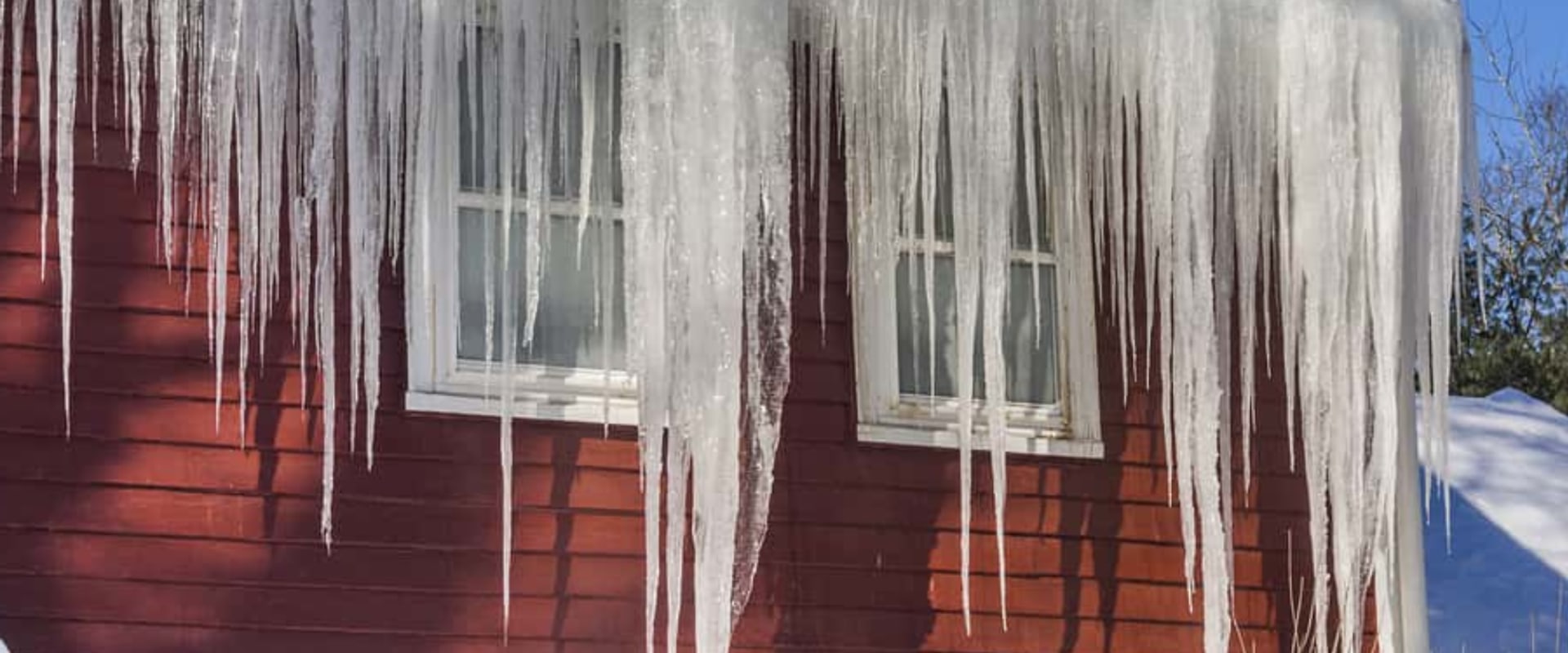 Understanding Ice Dams and Snow Buildup: Essential Roof Maintenance Tips